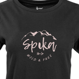 Close-up of the pink mountain Spika Wild & Free script print on the GO Nomadic women's black T-shirt