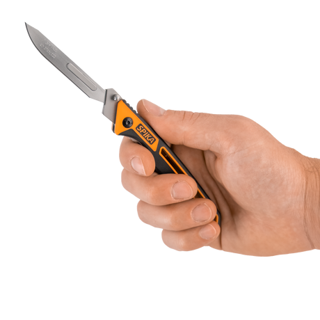 Spika Command folding scalpel opened and held in hand to show the compact handle and blade size