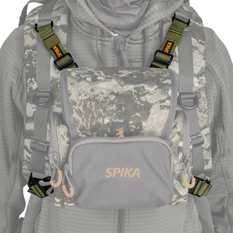 Spika Drover bino pack connecting straps fitted from shoulder harness to a camo bino pack on the chest