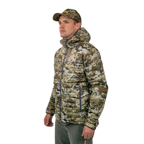 Model in the Spika Chase men's Biarri Camo puffer jacket and cap, three-quarter side view