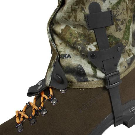 Spika Ranger adult gaiter in Biarri Camo, close-up of the instep strap and lace hook on a boot