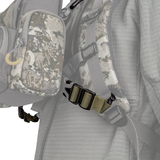 Spika Drover bino pack connecting strap clipped between a bino pack and backpack shoulder strap