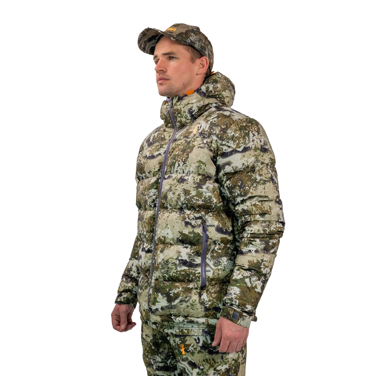 Man modelling the Spika Terra men's puffer jacket in Biarri Camo, three-quarter view