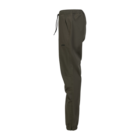 Spika Reign women's pants in Olive Summit, side profile view with elastic cuffs
