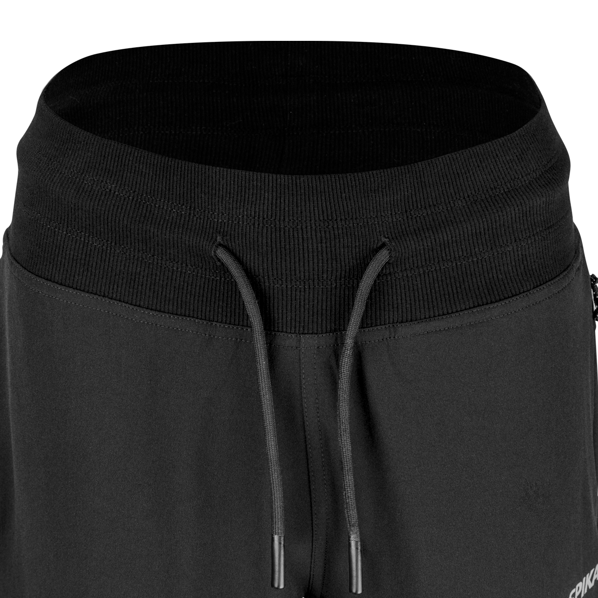 Close-up of the wide ribbed waistband and drawcord on Spika GO Casual women's black jogger pants
