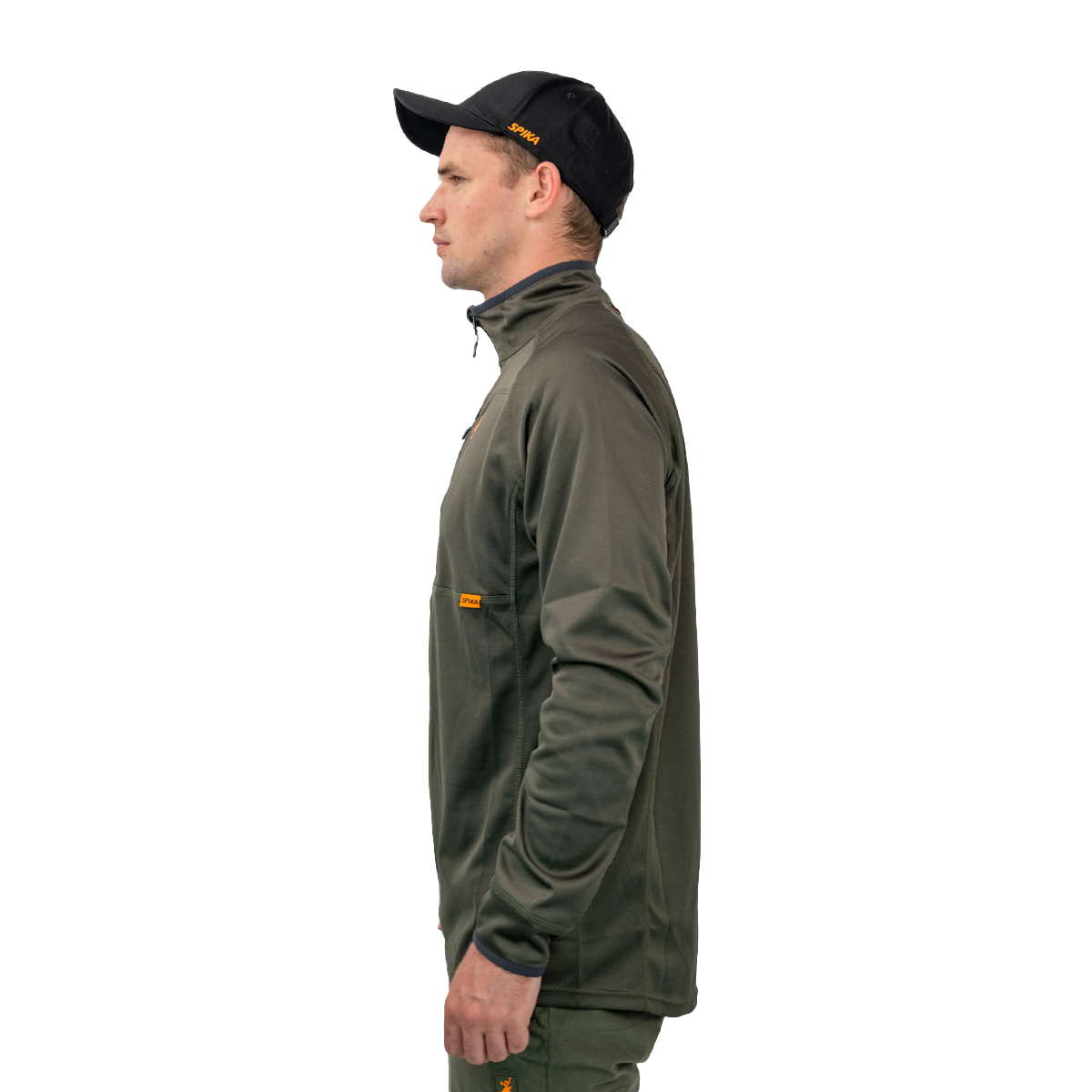 Man wearing the Spika Guide men's lightweight top in Olive, side profile view