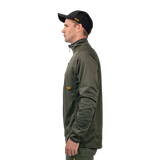 Man wearing the Spika Guide men's lightweight top in Olive, side profile view