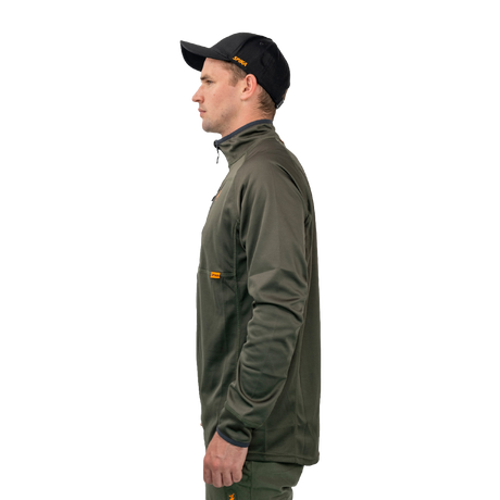 Man wearing the Spika Guide men's lightweight top in Olive, side profile view