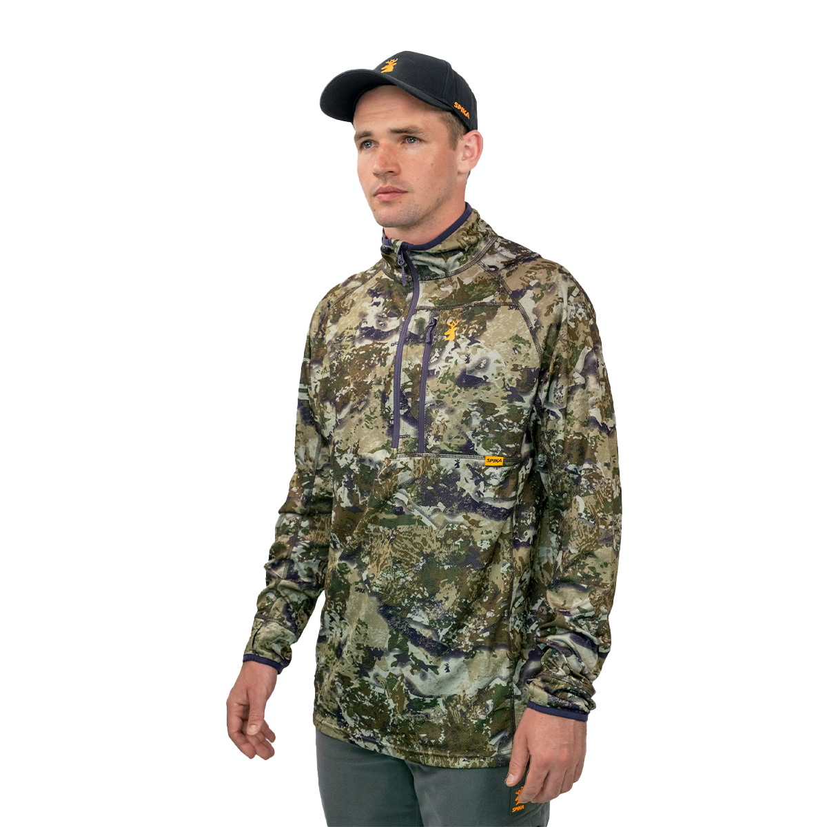 Man wearing the Spika Guide men's lightweight top in Biarri Camo, three-quarter side view