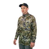 Man wearing the Spika Guide men's lightweight top in Biarri Camo, three-quarter side view