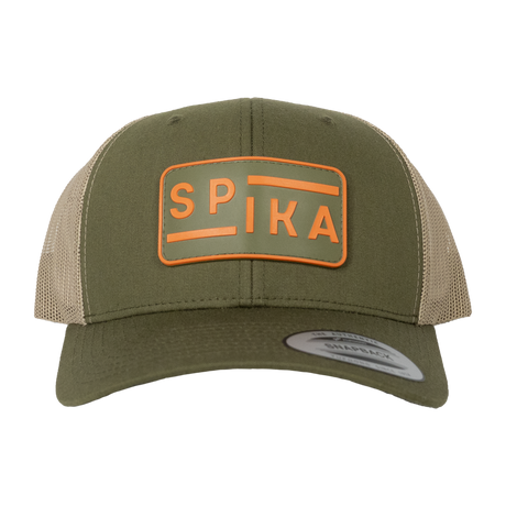 Spika Urban Waypoint trucker cap in Olive/Tan, front view of the orange rubber logo patch