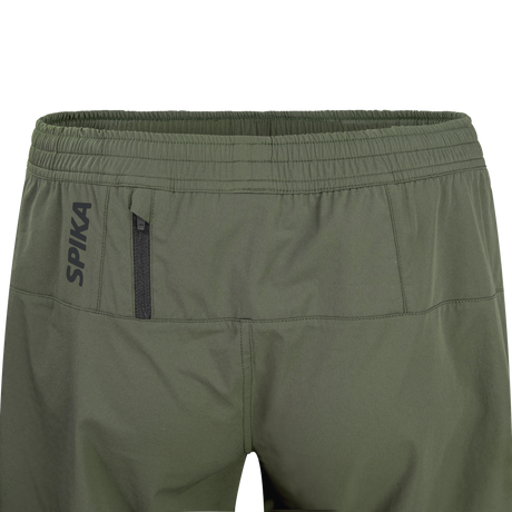 Close-up of the rear zip pocket and SPIKA logo on Spika GO Arid men's olive quick dry shorts